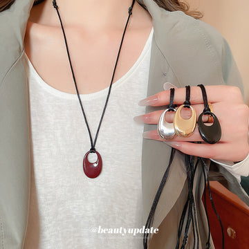 Open Oval Cord Pendant Necklace in Red and Silver Tones