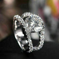 Silver Tone Double Row Crossover Ring With Clear Stones view 1