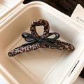 Brown And Black Leopard Fabric Wrapped Hair Claw With Large Bow view 6