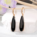 Gold Tone Long Oval Faceted Crystal Hook Earrings in Seven Colors view 6