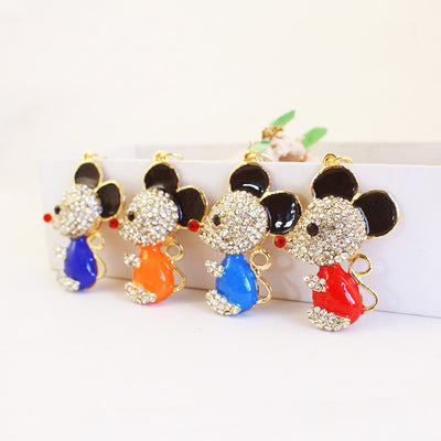 Four rhinestone mouse charms displayed in dark blue, orange, bright blue, and red.