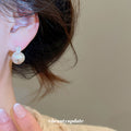 Textured Round Ball Stud Earrings With Snowflake Crystal Tops view 3