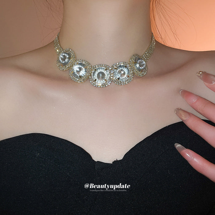 Five Crystal Medallion Collar Necklace With Polished Metal Tone Details