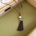 Black Cord Geometric Pendant Necklaces in Seven Designs view 11