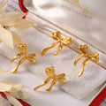 Bow Stud Earrings Gold Or Steel Titanium Metal Finish view 2