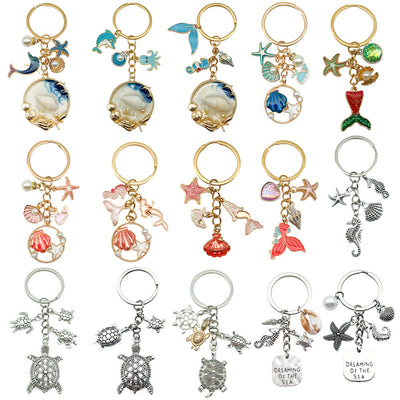 Image 5 showing a set of six different key chains with charms.