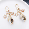 Four Gold Tone Shell Starfish and Pearl-Look Clasp Charms for Accessory Making view 2