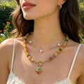 Round Bead Necklaces With Three Gold And Cream Strawberry Pendants view 4