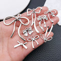 Metallic Bow and Butterfly Metal Charms with 24 Listed Options view 2