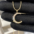 Gold Tone Crescent Moon Pendant Necklace with Clear Stones view 1