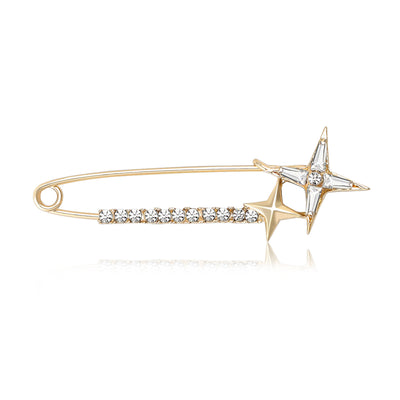 Gold star safety pin brooch rhinestone bar on white background