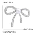 Crystal Ribbon Bow Brooch With Central Faux Pearl Accent view 6