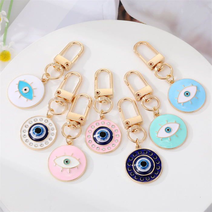 Gold Tone Enamel Lash and Crystal Evil Eye Clip Keychains