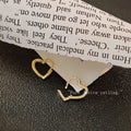 Gold Heart Huggie Hoop Earrings Polished Open Outline view 4