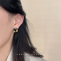 Gold Tone Black Shield Faceted Stone And Leaf Branch Stud Earrings view 2