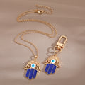 Gold and Silver Tone Open Hamsa Necklaces and Clip Keychains view 4