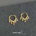 Gold Heart Huggie Hoop Earrings With Dangling Ball Charms view 3
