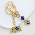 Elephant And Evil Eye Bead Keychain With Rhinestone Charm Cluster view 6