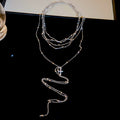 Layered Snake And Cross Pendant Necklace In Two Tones view 6