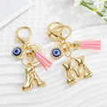 Gold Tone Initial Letter Keychain with Evil Eye and Pink Tassel view 2
