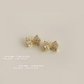 Gold Tone Clear Stone Tiny Bow Stud Earrings For Women view 3