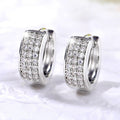 Wide Multi Row Pavé Huggie Hoop Earrings in Silver Tone view 4