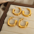 Bold Sculpted Open Hoop Earrings in Polished Gold Tone view 4