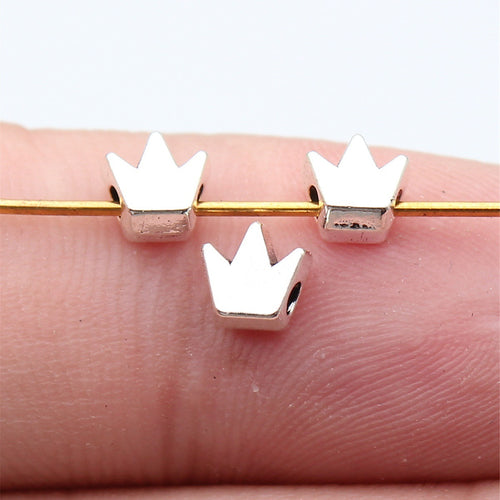 Front view of tiny crown beads in the pictured finish