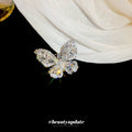 Silver Tone Butterfly Brooch With Layered Clear Marquise Crystals view 4