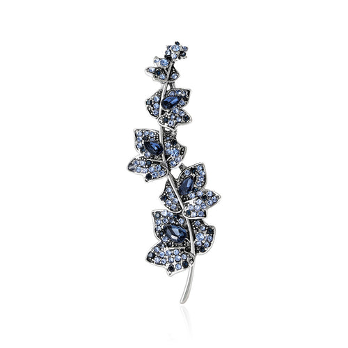 Blue rhinestone silver-tone leaf branch brooch front view