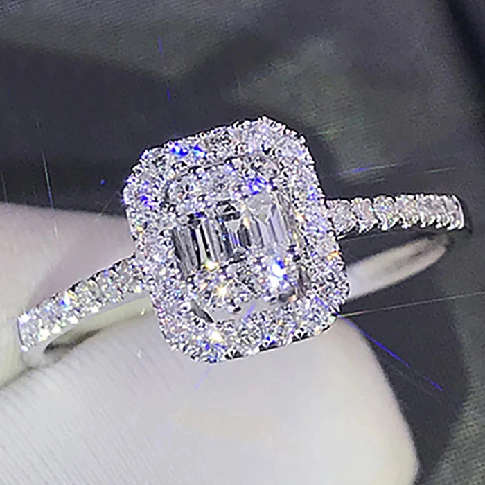 Cushion-Shaped Baguette Cluster Halo Ring In Silver Tone