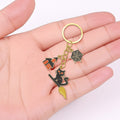 Black Cat Broom Haunted House Spider Web Gold Keychain view 3