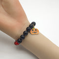 Black Bead Pumpkin Charm Stretch Bracelet Red Accents view 3