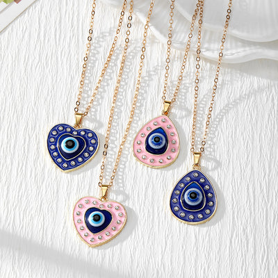 Main product view of gold Tone Rhinestone Evil Eye Heart and Teardrop Pendant Necklaces