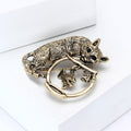 Cat Fishing Brooch With A Textured Cat Leaning Over A Round Frame With A Dangling Fish view 3