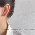 Gold Tone Mini Round Stud Earrings Cream Bow Accent view 3