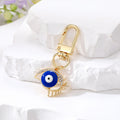 Gold Tone Openwork Lash Enamel Evil Eye Clip Keychains in Five Colors view 5