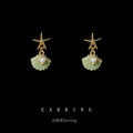 Gold Tone Starfish And Shell Fan Stud Earrings In White And Green view 2