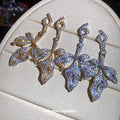 Crystal Leaf Branch Drop Earrings in Two Metal Tones view 4