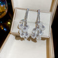 Cascading Crystal Petal Drop Earrings with Reflective Details view 2