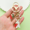 Easter Bunny Charm Keychains Featuring Pink Bow Across 19 Pictured Variations view 1