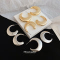 Pair of Metal Tone Wide Polished C-Shaped Hoop Earrings in Two Sizes view 2