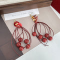 Burgundy Wire Loop and Red Bead Long Dangle Earrings view 3