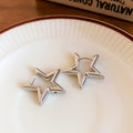 Open Star Metal Clip On Earrings in Gold and Silver Tones view 6