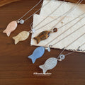 Small Fish Pendant Cord Necklaces in Five Soft Colors view 2