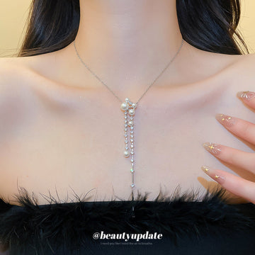 Silver Tone Pearl and Crystal Tassel Y Necklace With Decorative Details