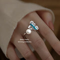 Silver Tone Blue Butterfly Wing Clear Stone And Pearl Open Ring view 1