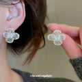 Openwork Four Petal Flower Stud Earrings in Two Finishes view 2