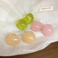 Translucent Round Resin Stud Earrings in Cream and Green view 4