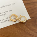 Polished U Shape Huggie Earrings in Silver and Gold Tones view 7